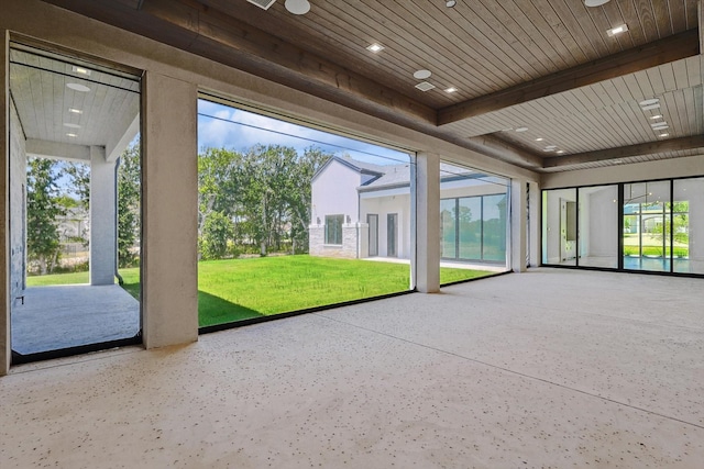 unfurnished sunroom featuring wooden ceiling