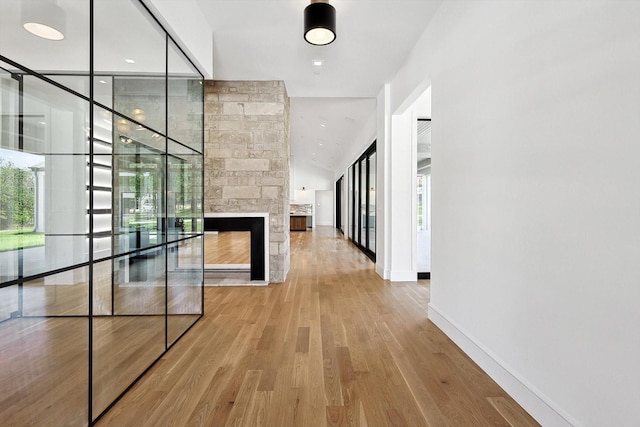1036 Hat Creek Rd, Bartonville, TX 76226 - corridor with plenty of natural light and wood finished floors