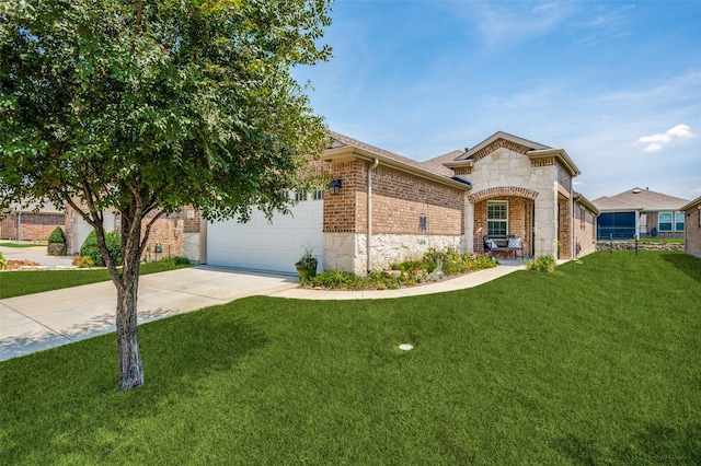 view of front of house with brick siding, a front yard, a garage, stone siding, and driveway