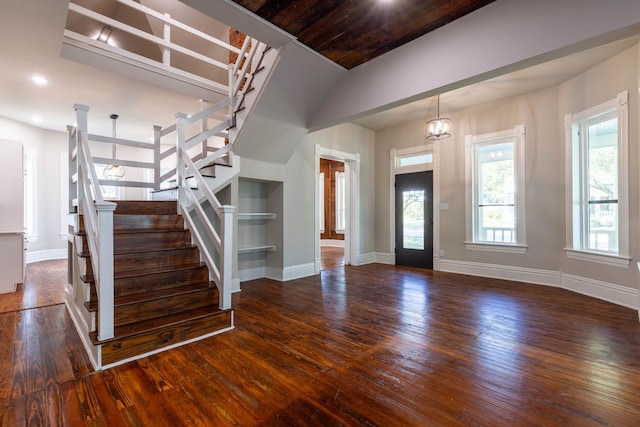 607 N Dallas St, Ennis, TX 75119 - foyer entrance featuring stairway, baseboards, hardwood / wood-style flooring, and plenty of natural light