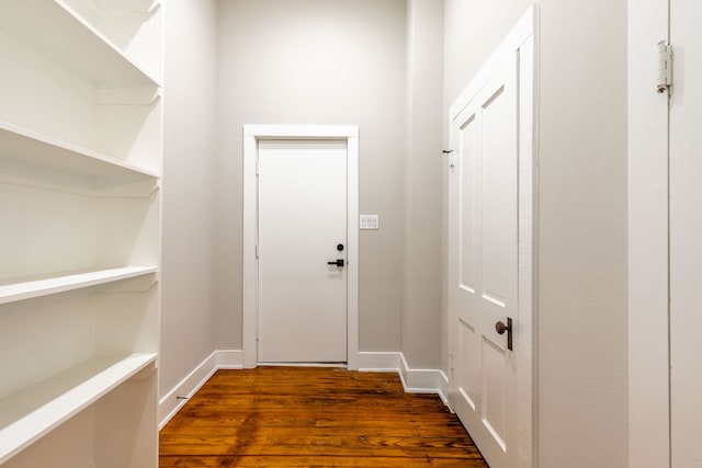 607 N Dallas St, Ennis, TX 75119 - doorway featuring baseboards and dark wood-style floors