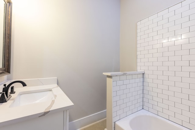 bathroom with vanity and washtub / shower combination