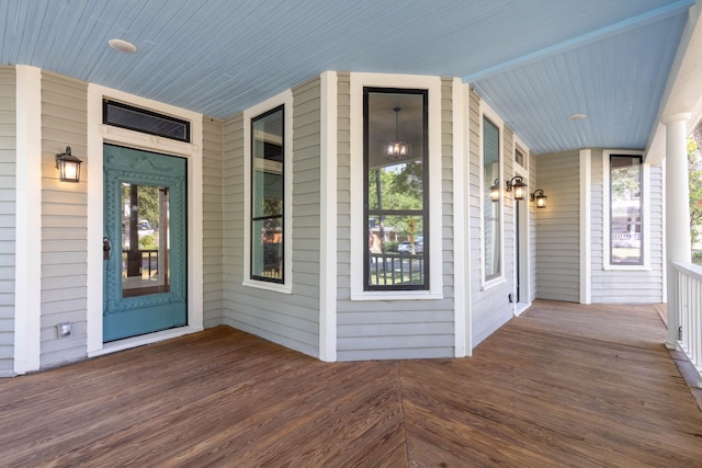 doorway to property featuring a porch