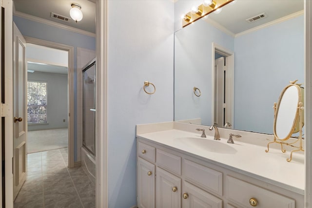 full bath featuring ornamental molding, visible vents, and vanity