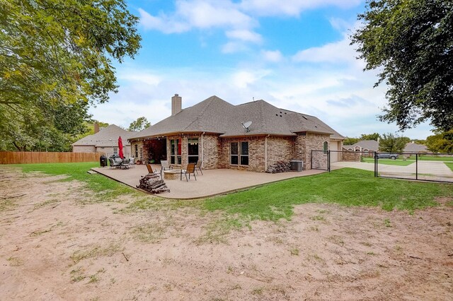 rear view of property with a patio area and central AC unit