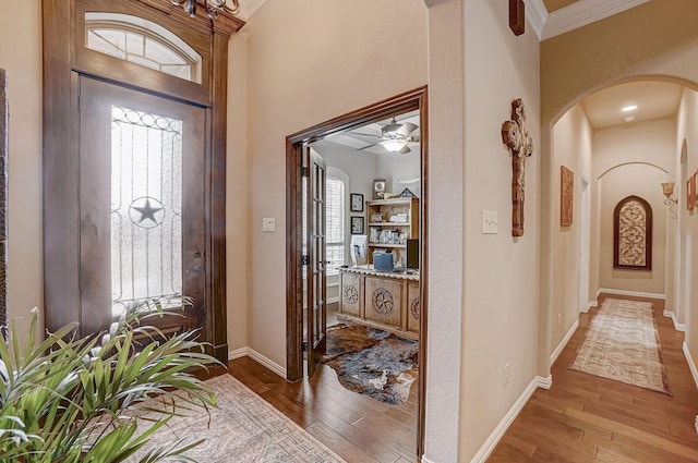 entryway featuring ceiling fan and hardwood / wood-style floors