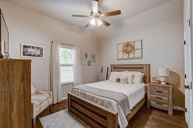 bedroom featuring dark hardwood / wood-style floors and ceiling fan