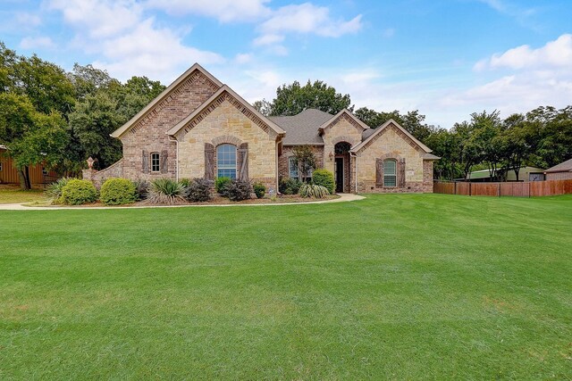 view of front facade with a front lawn