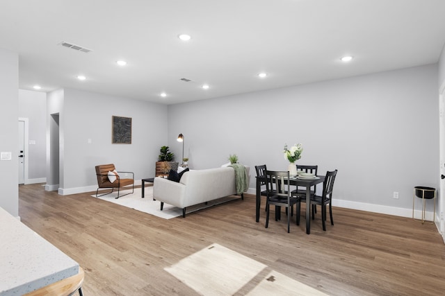 living room with light wood-type flooring