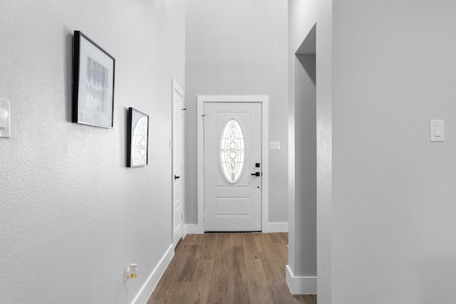 doorway to outside with hardwood / wood-style floors