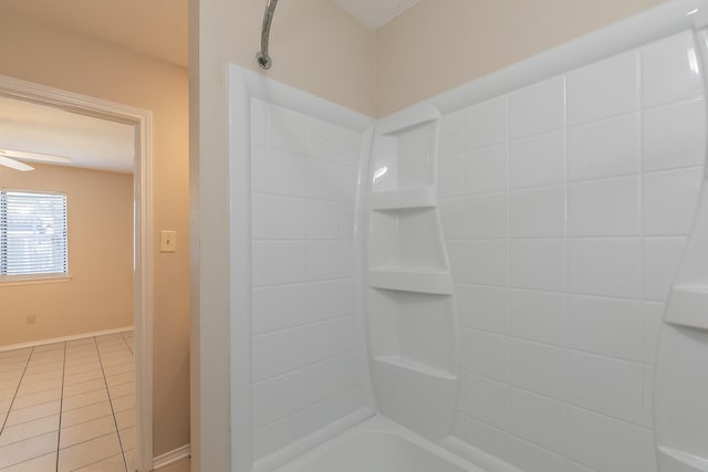 bathroom featuring ceiling fan, tile patterned floors, and bathtub / shower combination