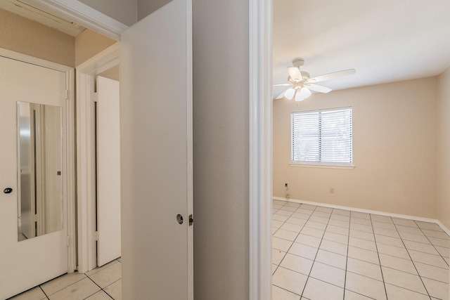 corridor featuring light tile patterned flooring