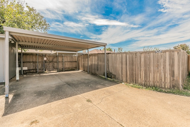 view of parking featuring a carport