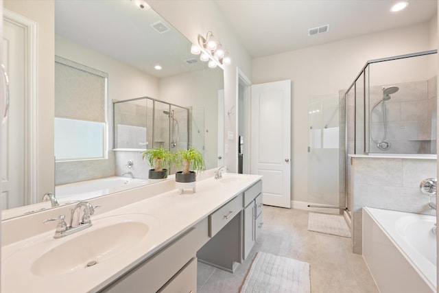 bathroom featuring tile patterned floors, vanity, and toilet