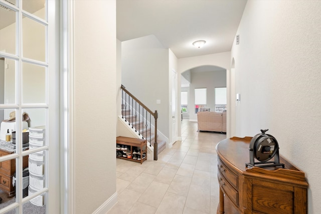 carpeted living room with ceiling fan