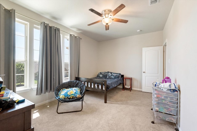 carpeted bedroom with ceiling fan