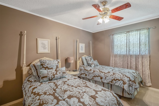 bedroom with a textured ceiling, carpet, crown molding, and ceiling fan