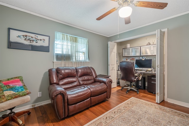 office area featuring ceiling fan, a textured ceiling, and hardwood / wood-style flooring