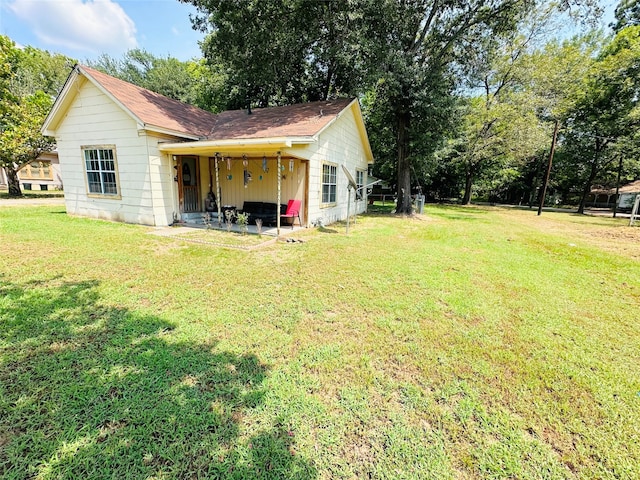 exterior space with a yard