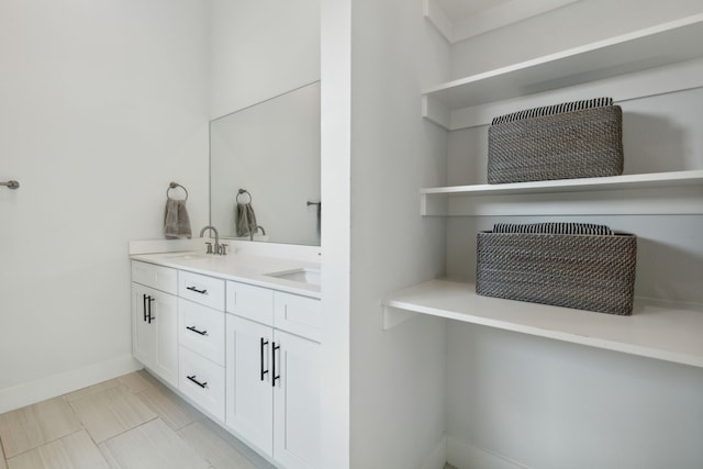 bathroom with vanity and tile patterned flooring