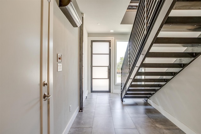 entryway with tile patterned flooring