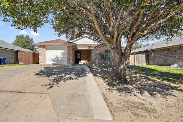 single story home featuring a garage