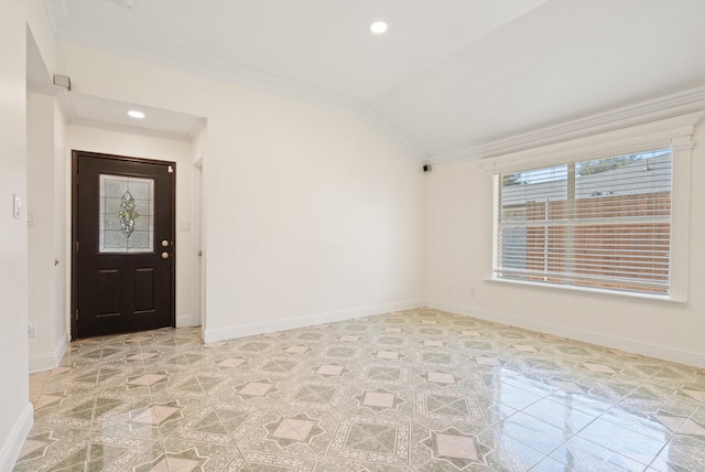 foyer entrance featuring crown molding and lofted ceiling