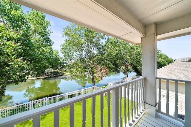 balcony featuring a water view