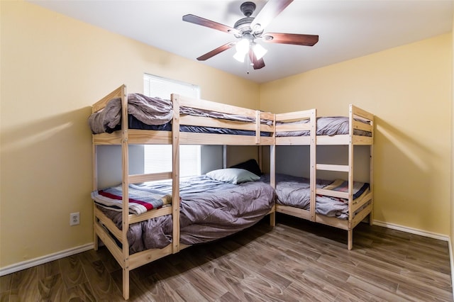 bedroom featuring ceiling fan and hardwood / wood-style floors