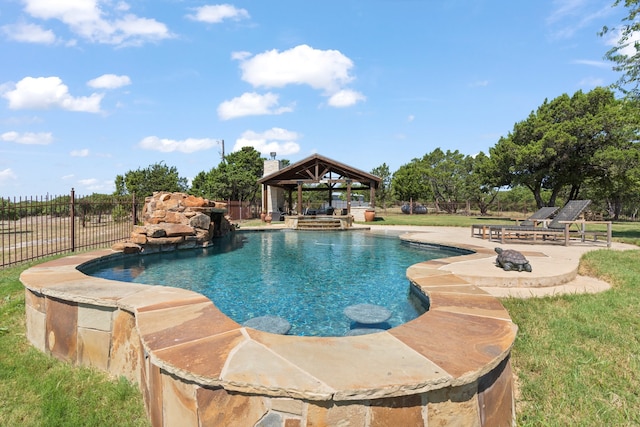 view of swimming pool with a patio, a yard, and a gazebo