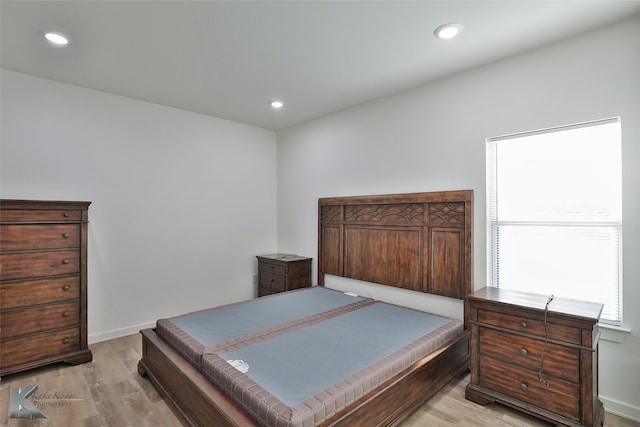 bedroom featuring light hardwood / wood-style floors