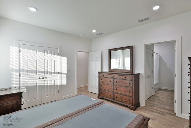 bedroom featuring light hardwood / wood-style floors