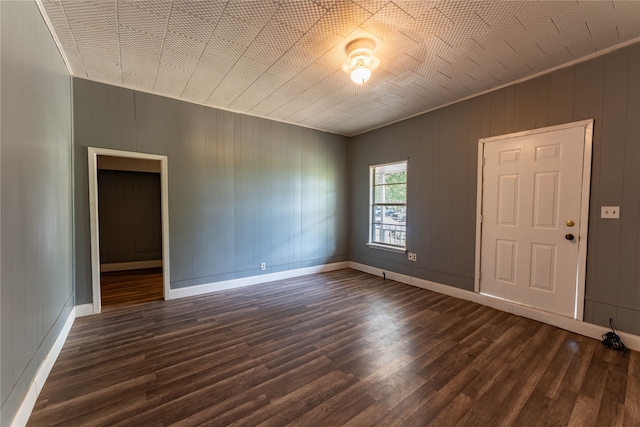 empty room with hardwood / wood-style flooring