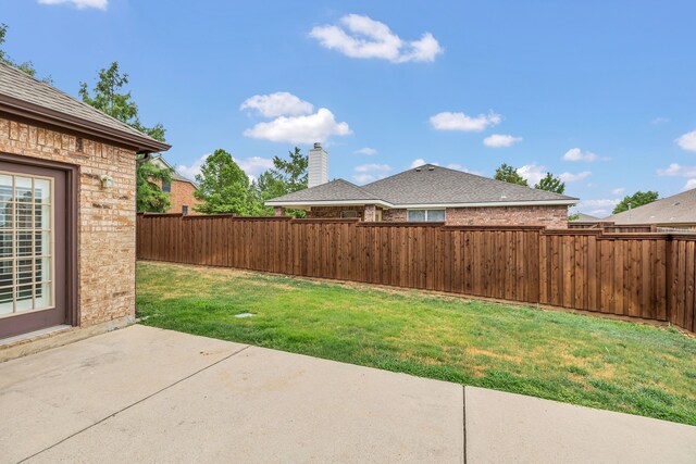 view of yard with a patio area