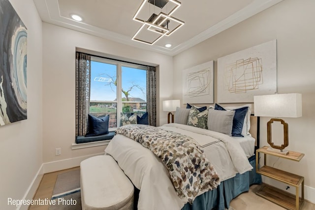 bedroom featuring hardwood / wood-style flooring and crown molding