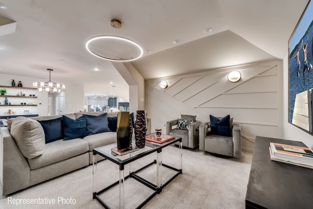 living room featuring a notable chandelier and light colored carpet