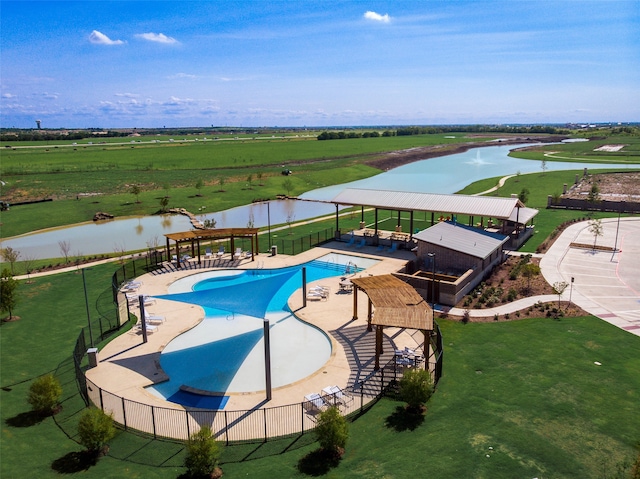 view of pool featuring a water view