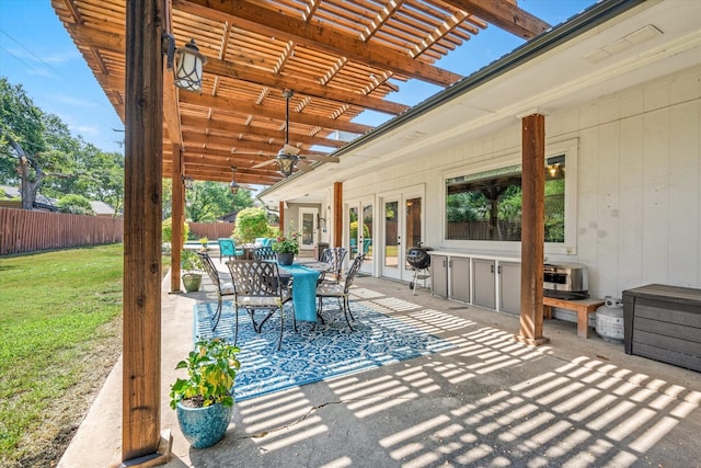 view of patio / terrace featuring ceiling fan, a pergola, and french doors