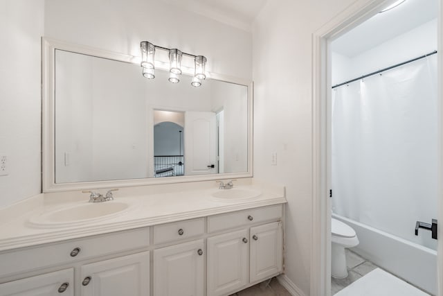 full bathroom with tile patterned floors, double sink vanity, shower / bath combination with curtain, and toilet