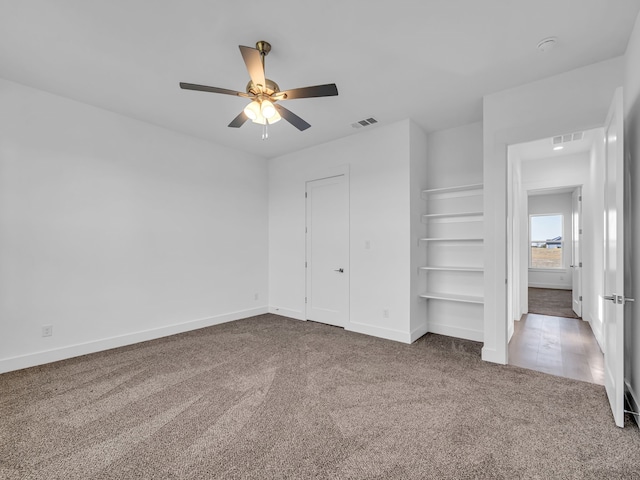 611 N Armstrong Rd, Venus, TX 76084 - unfurnished bedroom featuring carpet flooring, baseboards, and visible vents