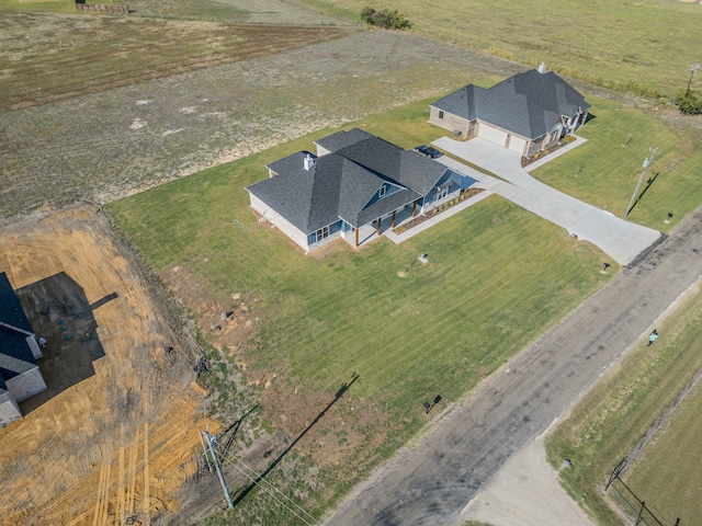 birds eye view of property featuring a rural view