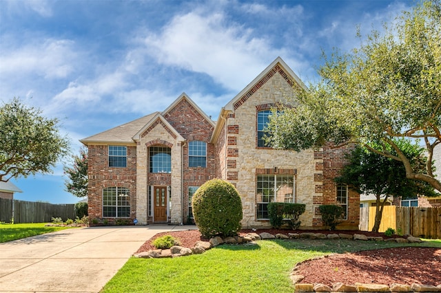 view of front property featuring a front lawn