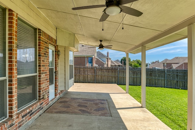 view of patio featuring ceiling fan