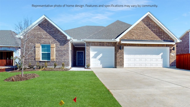 view of front of house featuring a front lawn and a garage