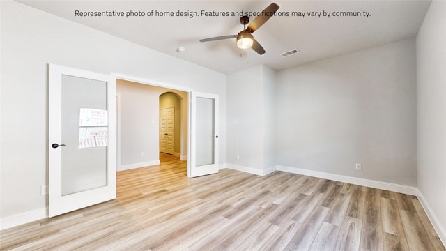 unfurnished bedroom with ceiling fan and light hardwood / wood-style flooring