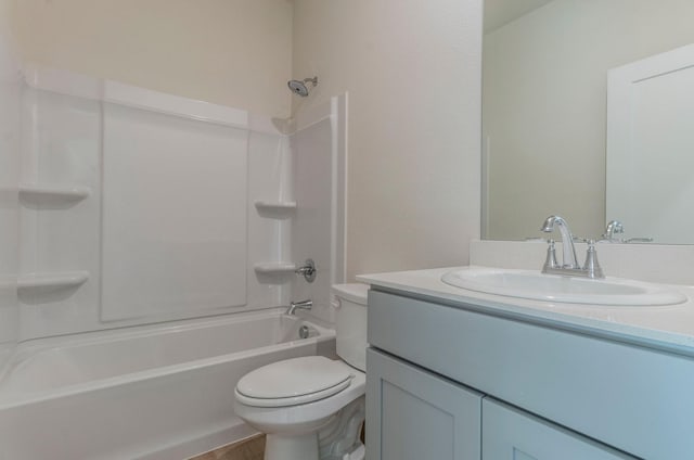 full bathroom featuring vanity, toilet, and shower / bath combination