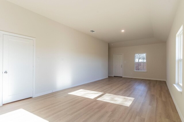 hall with light hardwood / wood-style floors