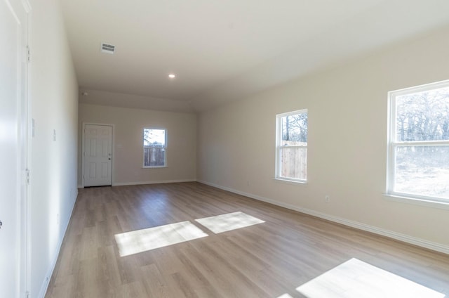 unfurnished room featuring light hardwood / wood-style flooring