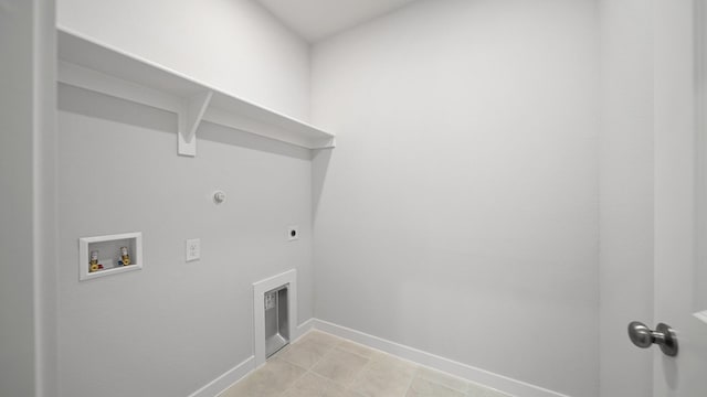 clothes washing area featuring washer hookup, hookup for a gas dryer, and electric dryer hookup