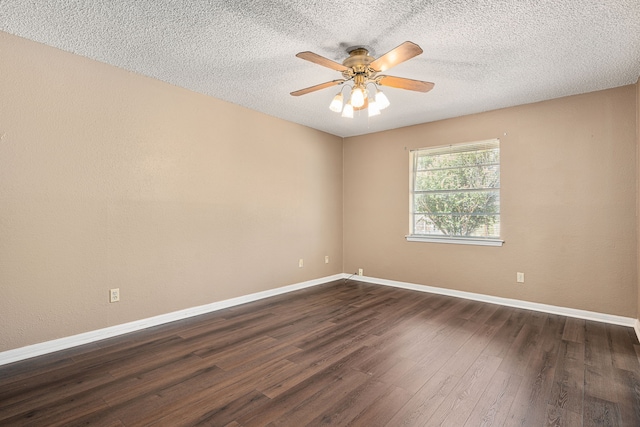 unfurnished room featuring ceiling fan, a textured ceiling, and dark hardwood / wood-style floors